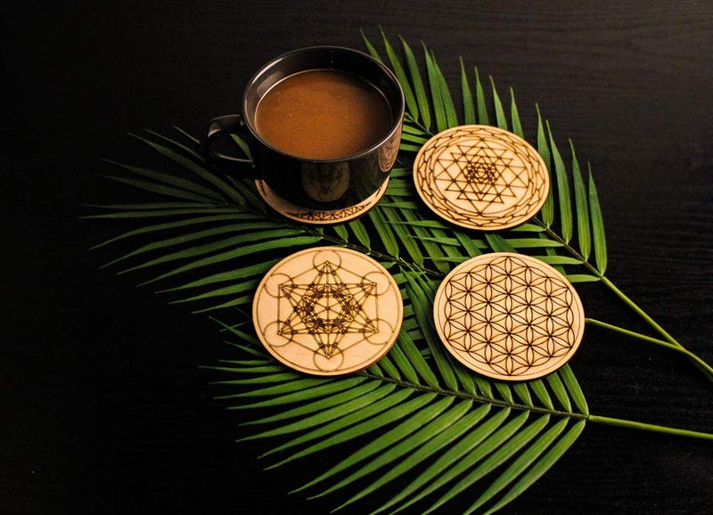 Fourth Level Manufacturing Sacred Geometry Coasters, One Set of Four Includes: 1 Metatrons Cube, 1 Sacred Om, 1 Sri Yantra, 1 Flower of Life, Drinks, Table Decorations for Hot and Cold Beverages, Protect Furniture - Image 1